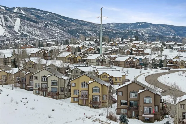 a view of a city with a building in the background