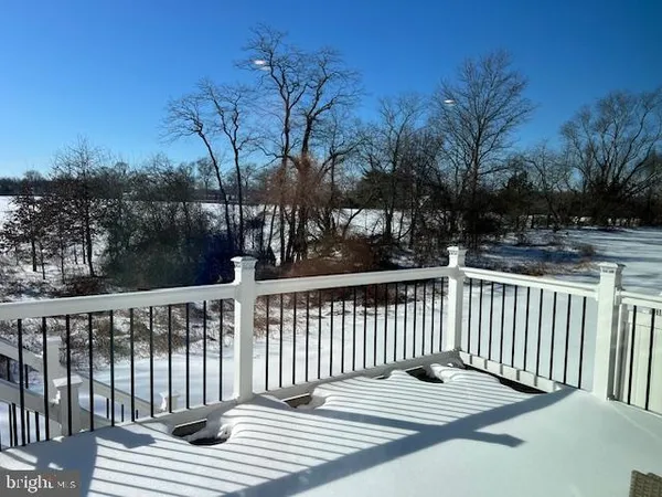 a view of a wooden roof deck