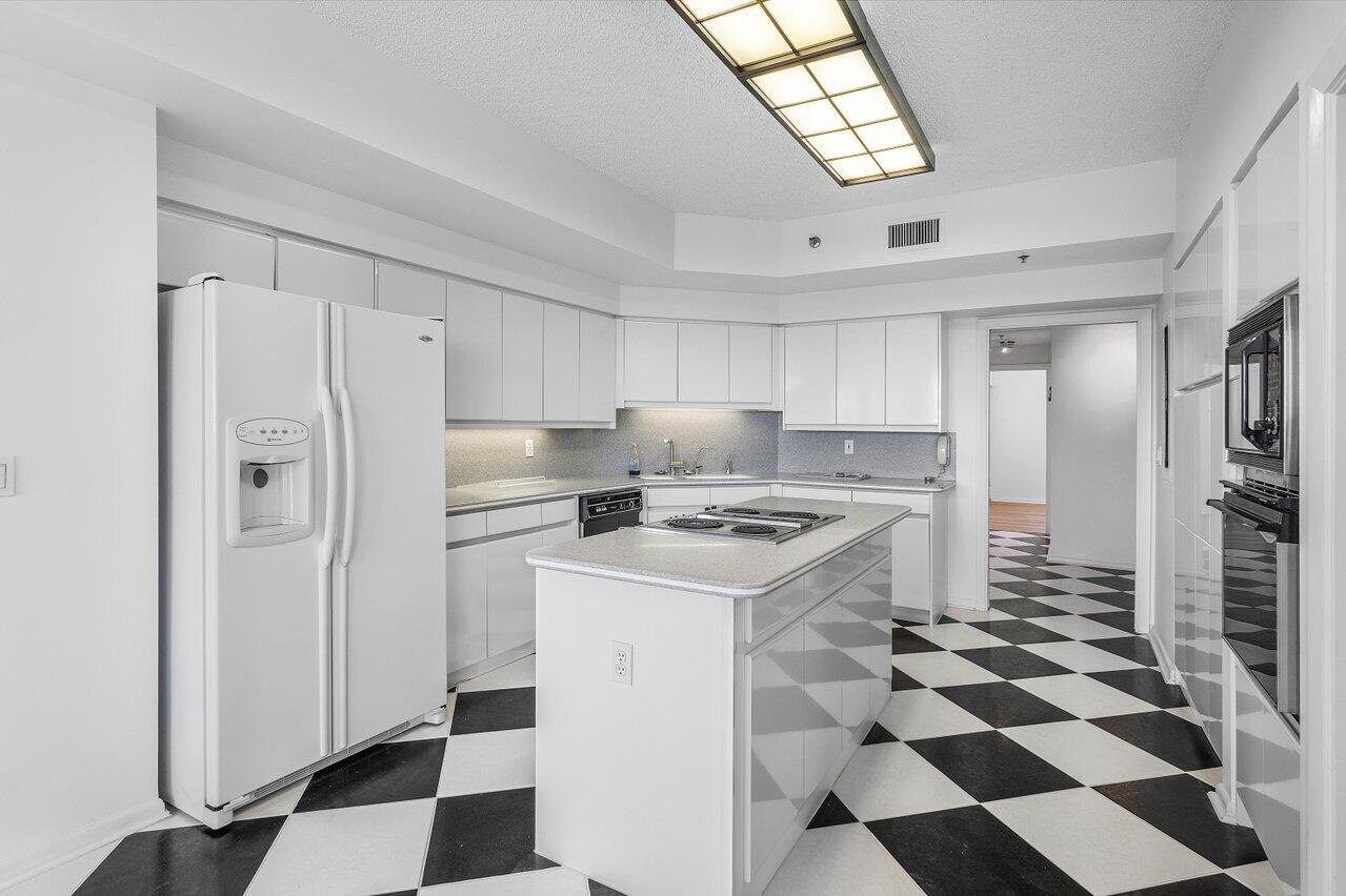 7351 Promenade Drive, Unit F702 Boca Raton, FL 33433 - Photo 10 of 34 Kitchen