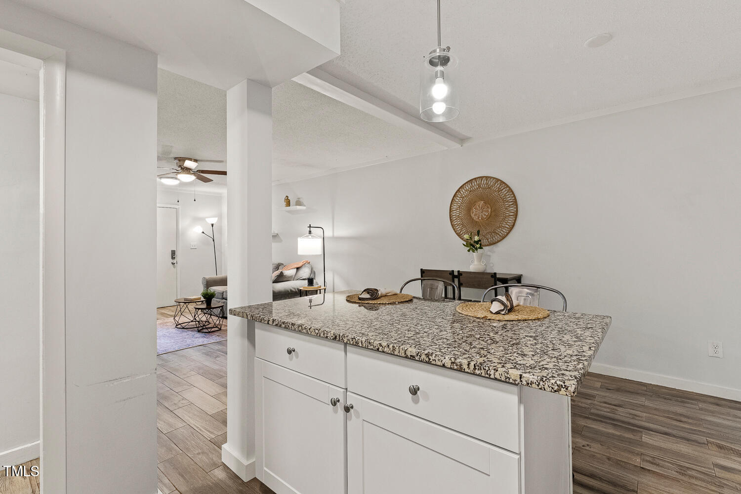 7002 Longstreet Drive, Unit C Raleigh, NC 27615 - Photo 13 of 31 a bathroom with a granite countertop sink and a mirror