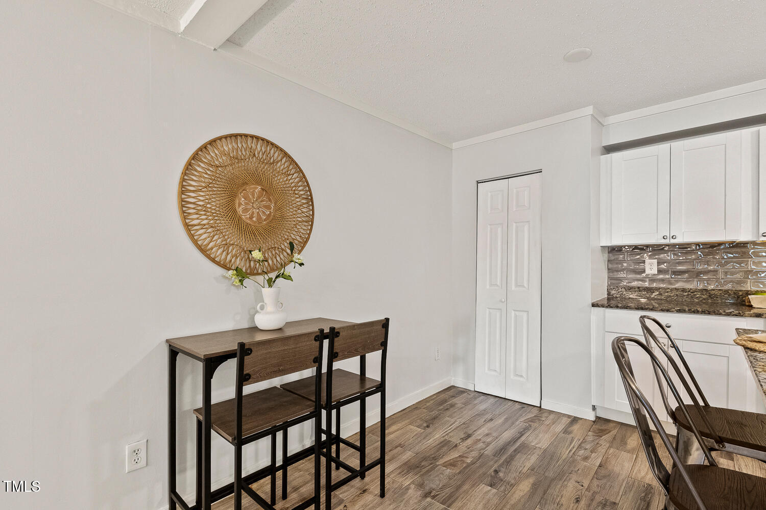 7002 Longstreet Drive, Unit C Raleigh, NC 27615 - Photo 14 of 31 a view of dining room and livingroom with furniture