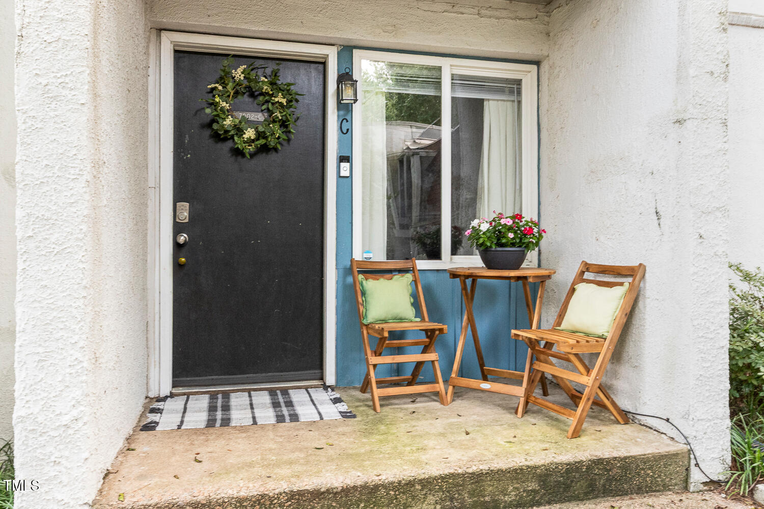 7002 Longstreet Drive, Unit C Raleigh, NC 27615 - Photo 27 of 31 a room with table and chair