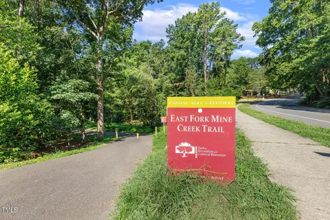 a sign that is on the side of the road