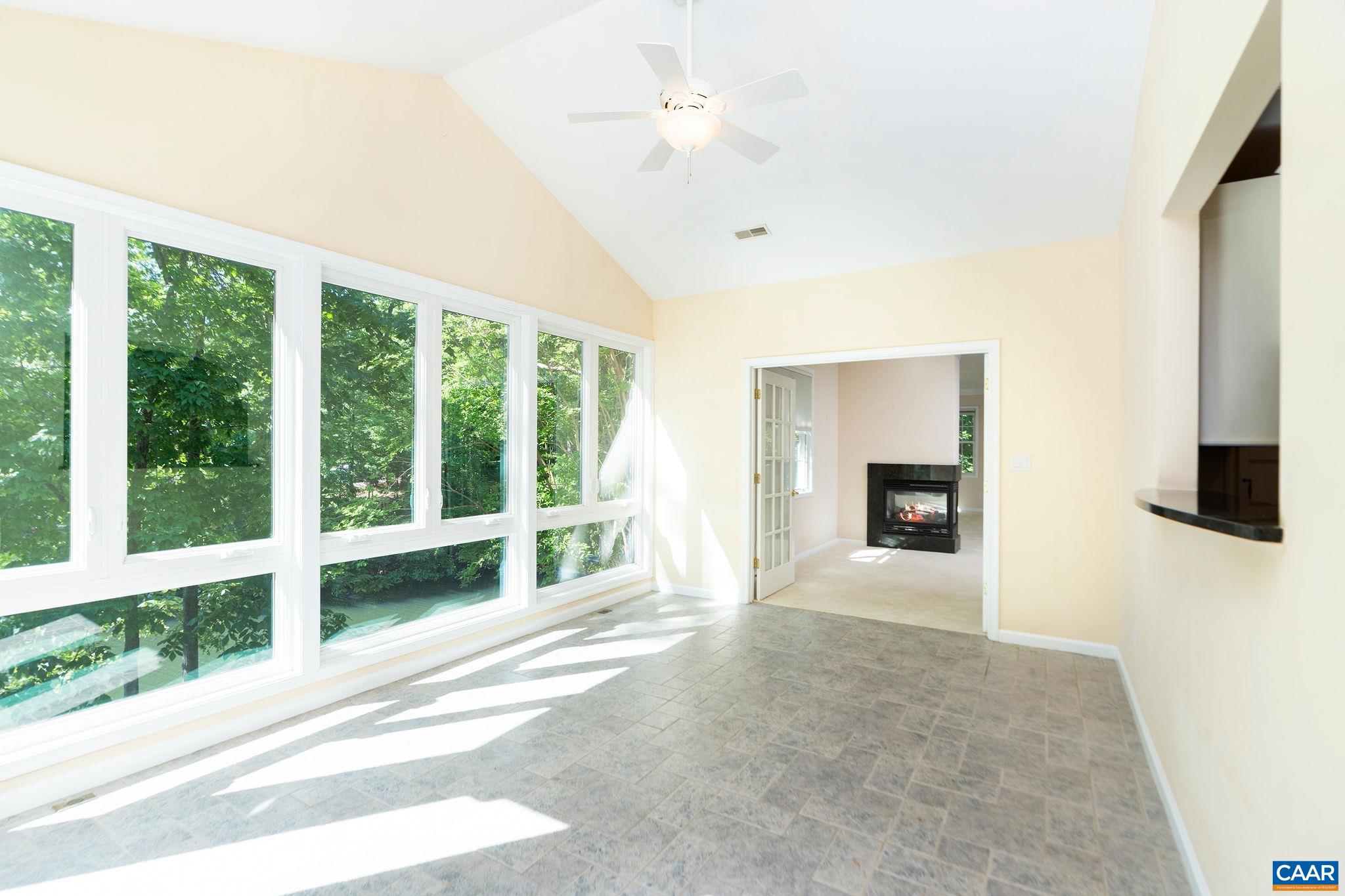 21 Amethyst Road Palmyra, VA 22963 - Photo 21 of 66 a view of an empty room with a fireplace and a window