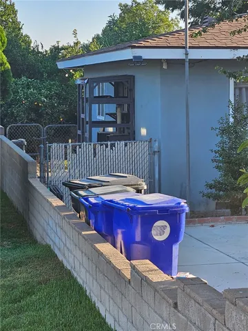 a view of a deck with a table and chairs
