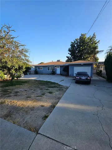 a car parked in front of a house