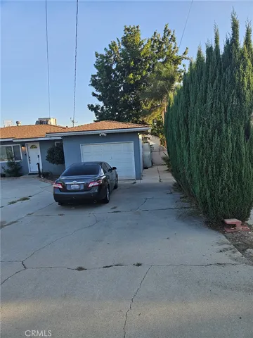 a car parked in front of a house