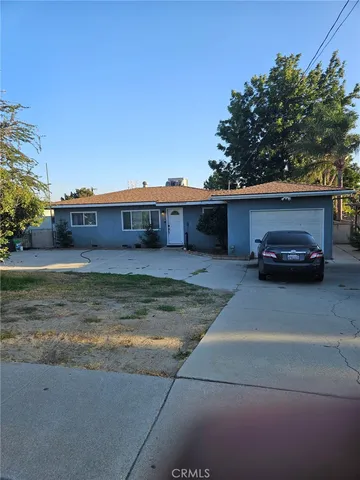 a car parked in front of a house