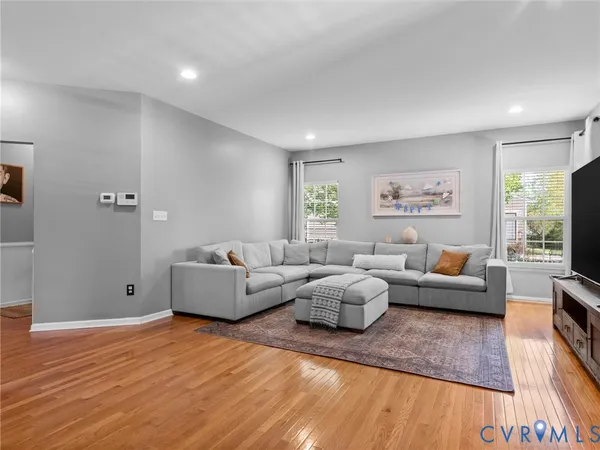 a living room with furniture and a couch