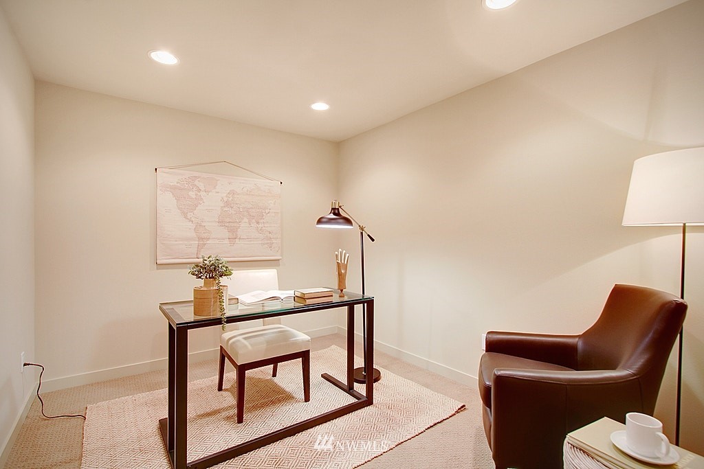 7757 Sand Point Way Northeast, Unit A Seattle, WA 98115 - Photo 20 of 25 a workspace room with furniture and a rug