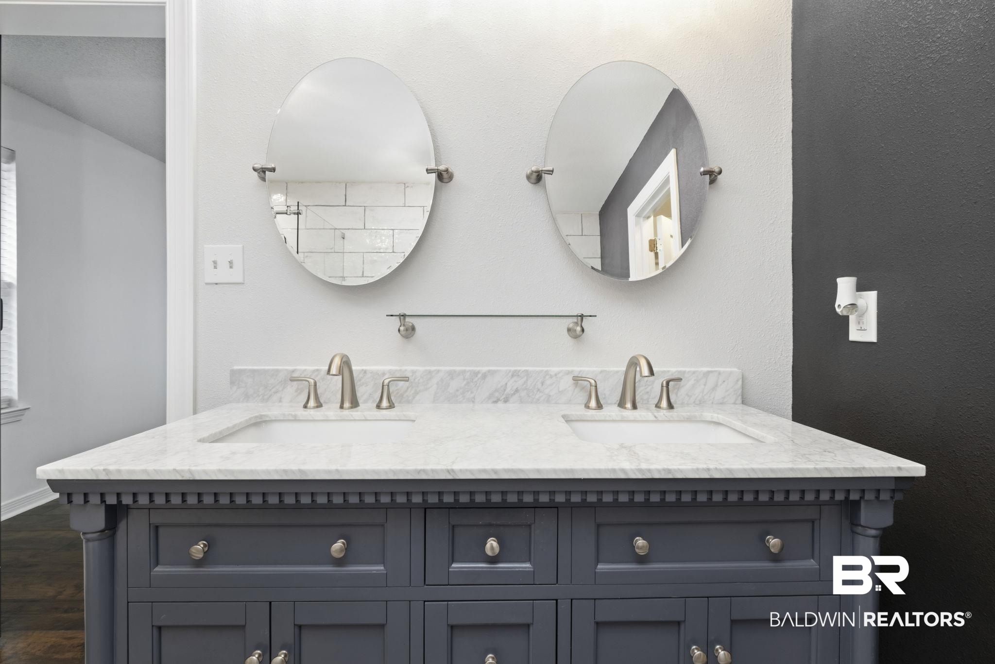 10670 Jeff Hamilton Road Mobile, AL 36695 - Photo 38 of 43 Full bath featuring double vanity, a textured wall, and dark wood finished floors