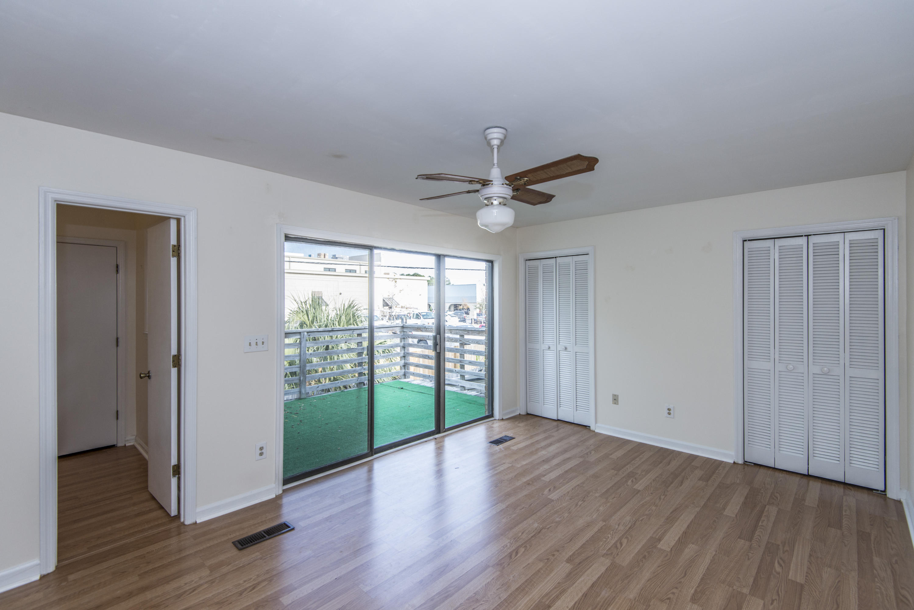 731 Ralston Court, Unit B Mount Pleasant, SC 29464 - Photo 14 of 24 Master bedroom w deck