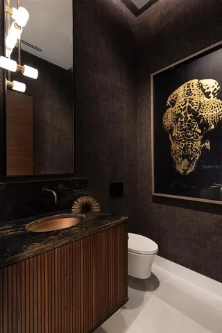 a bathroom with a sink and a toilet