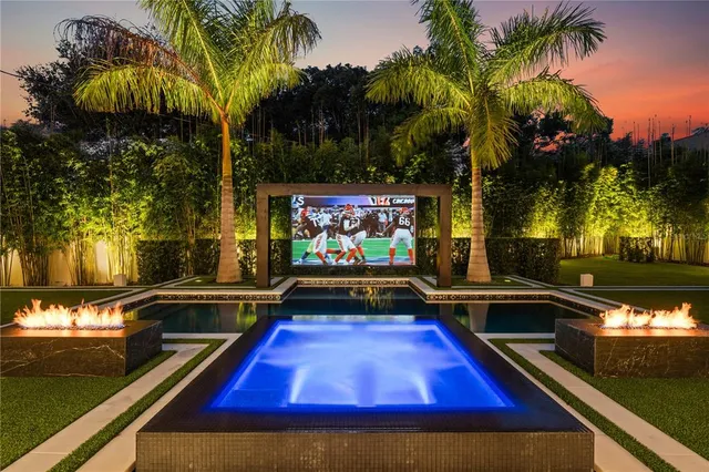 a view of swimming pool with chairs