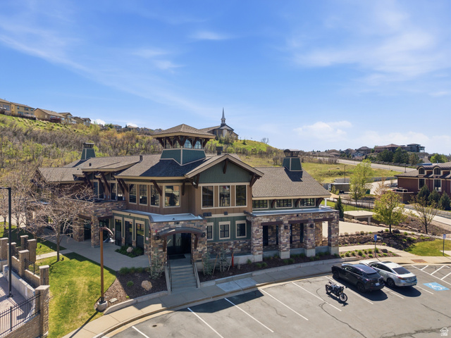 2007 Fielding Hill Lane Draper, UT 84020 - Photo 78 of 83 Multi-level building featuring stone and wood-finish siding, a prominent central cupola, and a gabled roofline