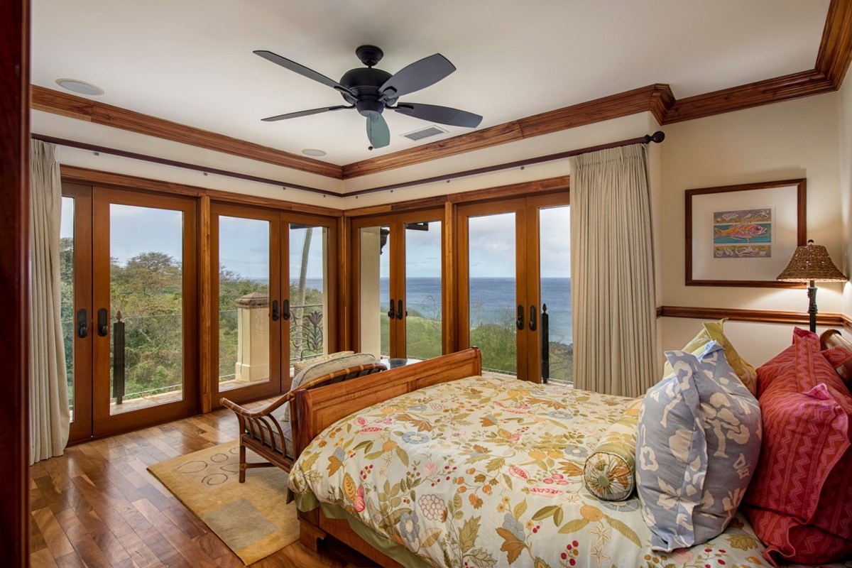 56-3083 Puakea Bay Road Kamuela, HI 96743 - Photo 21 of 30 a bed sitting in a bedroom next to a window