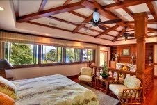 56-3083 Puakea Bay Road Kamuela, HI 96743 - Photo 24 of 30 a large bedroom with furniture and large windows