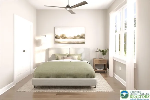 a bedroom with a bed and window