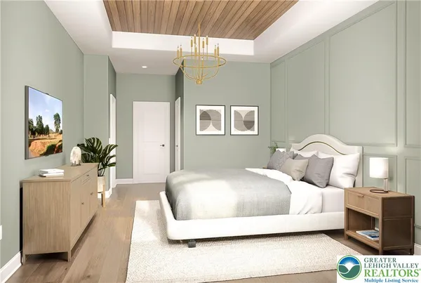 a bedroom with a bed a mirror and lamp
