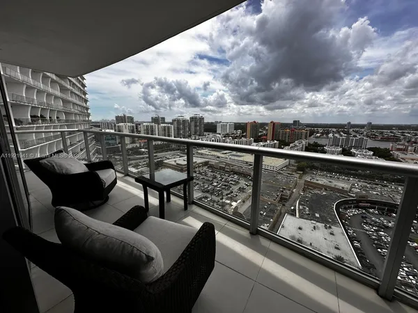 a view of balcony with outdoor seating