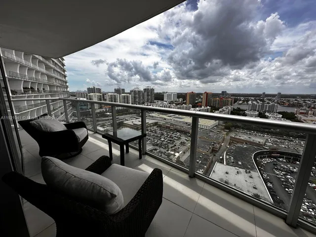 a view of balcony with outdoor seating