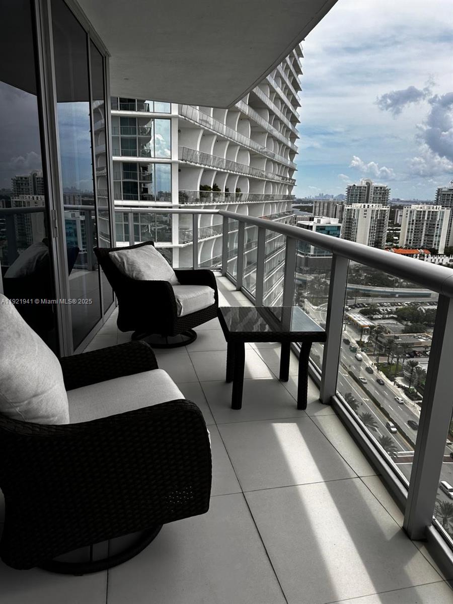 17001 Collins Avenue, Unit 2601 Sunny Isles Beach, FL 33160 - Photo 16 of 27 a view of balcony with outdoor seating