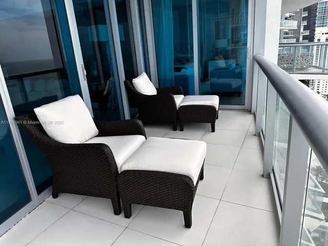 a view of a chairs in a balcony