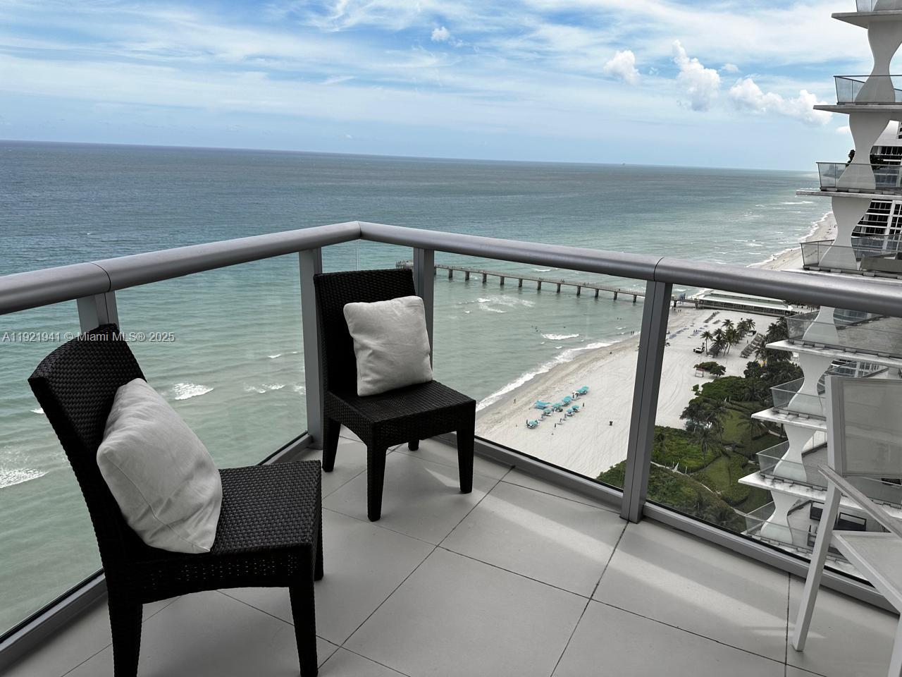17001 Collins Avenue, Unit 2601 Sunny Isles Beach, FL 33160 - Photo 20 of 27 a view of a chairs in a balcony