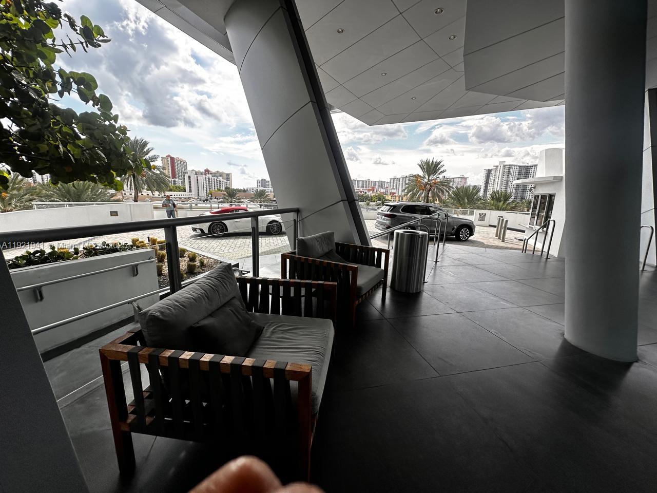 17001 Collins Avenue, Unit 2601 Sunny Isles Beach, FL 33160 - Photo 4 of 27 a living room with furniture