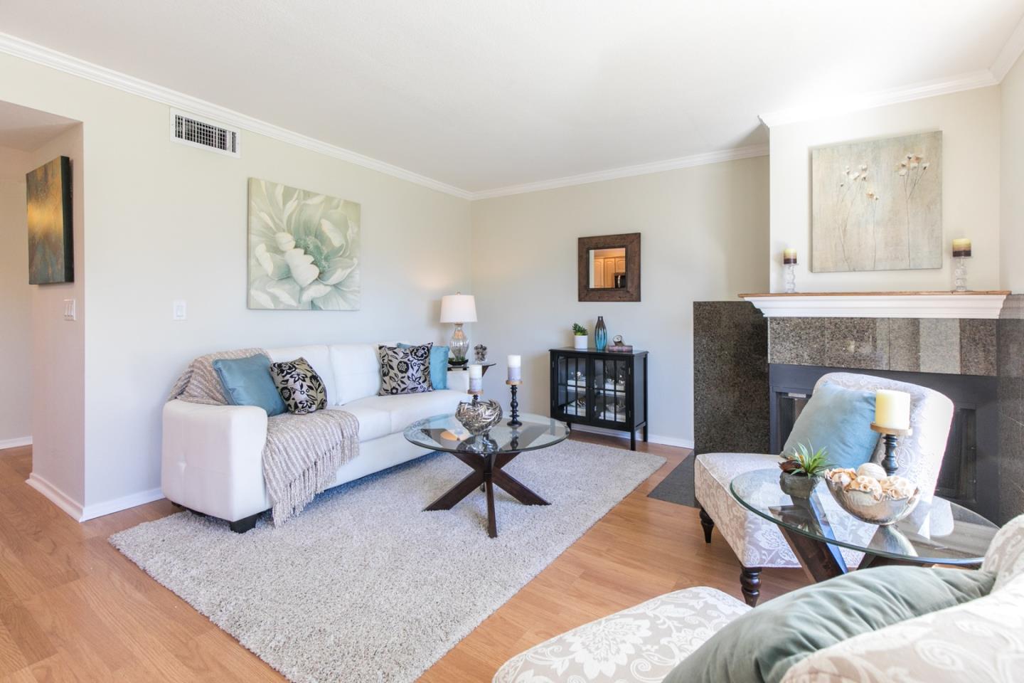 77 Redding Road Campbell, CA 95008 - Photo 4 of 22 a living room with furniture and a fireplace