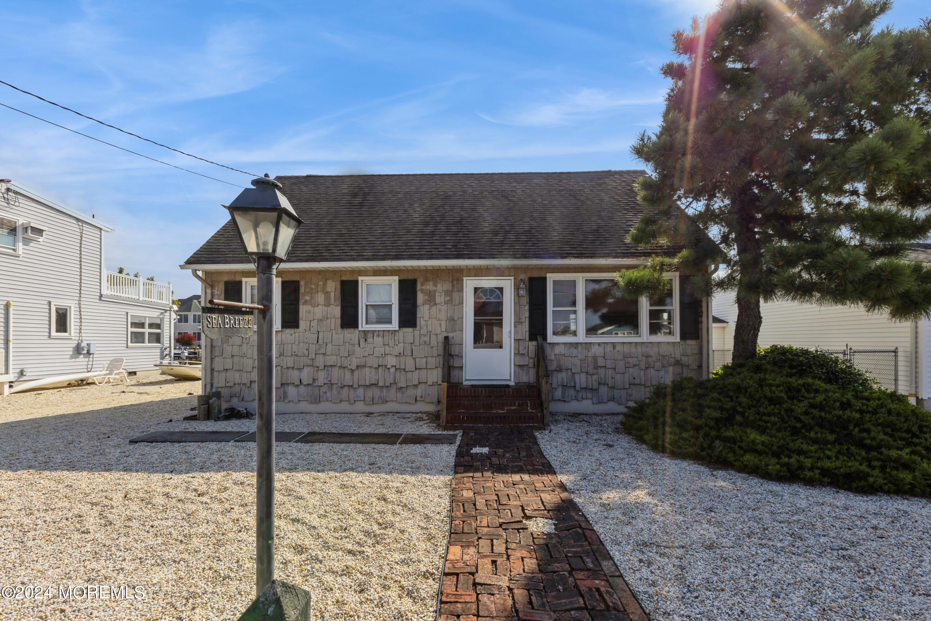 121 Montclair Road North Barnegat, NJ 08005 - Photo 1 of 15 a backyard of a house with lots of green space