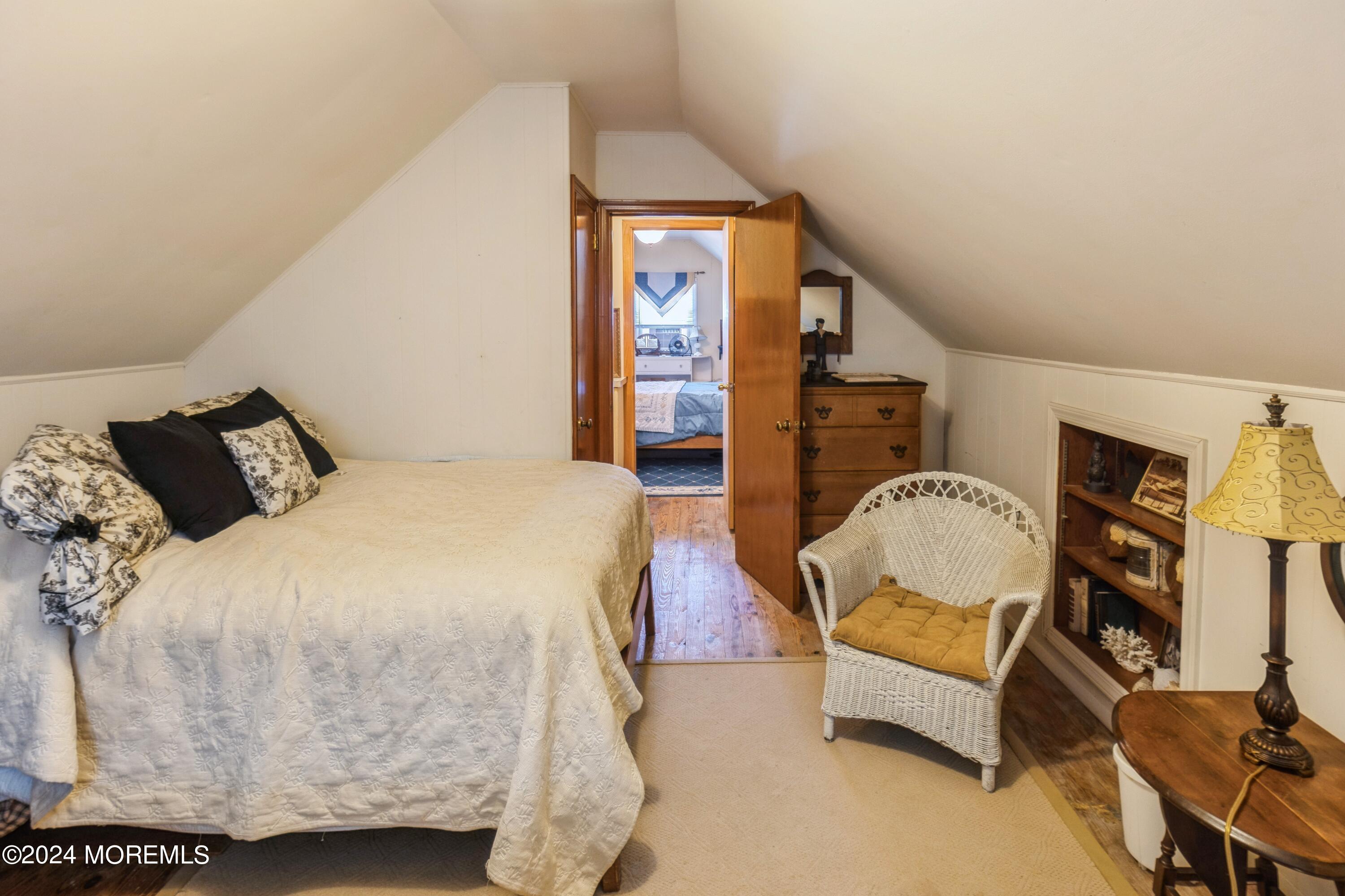 121 Montclair Road North Barnegat, NJ 08005 - Photo 15 of 15 a bed room with a bed and a lamp