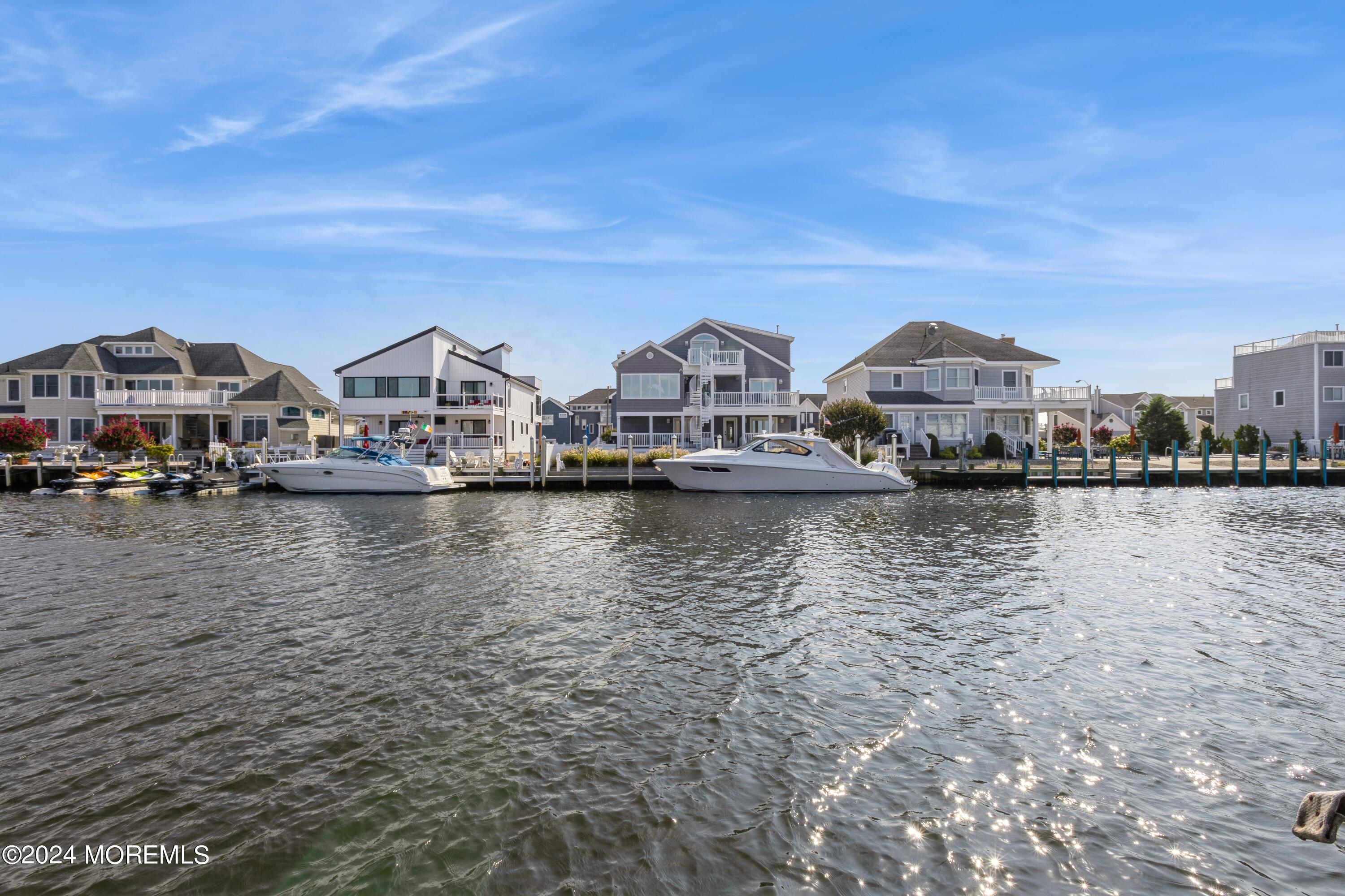 121 Montclair Road North Barnegat, NJ 08005 - Photo 2 of 15 a view of houses with water and city view