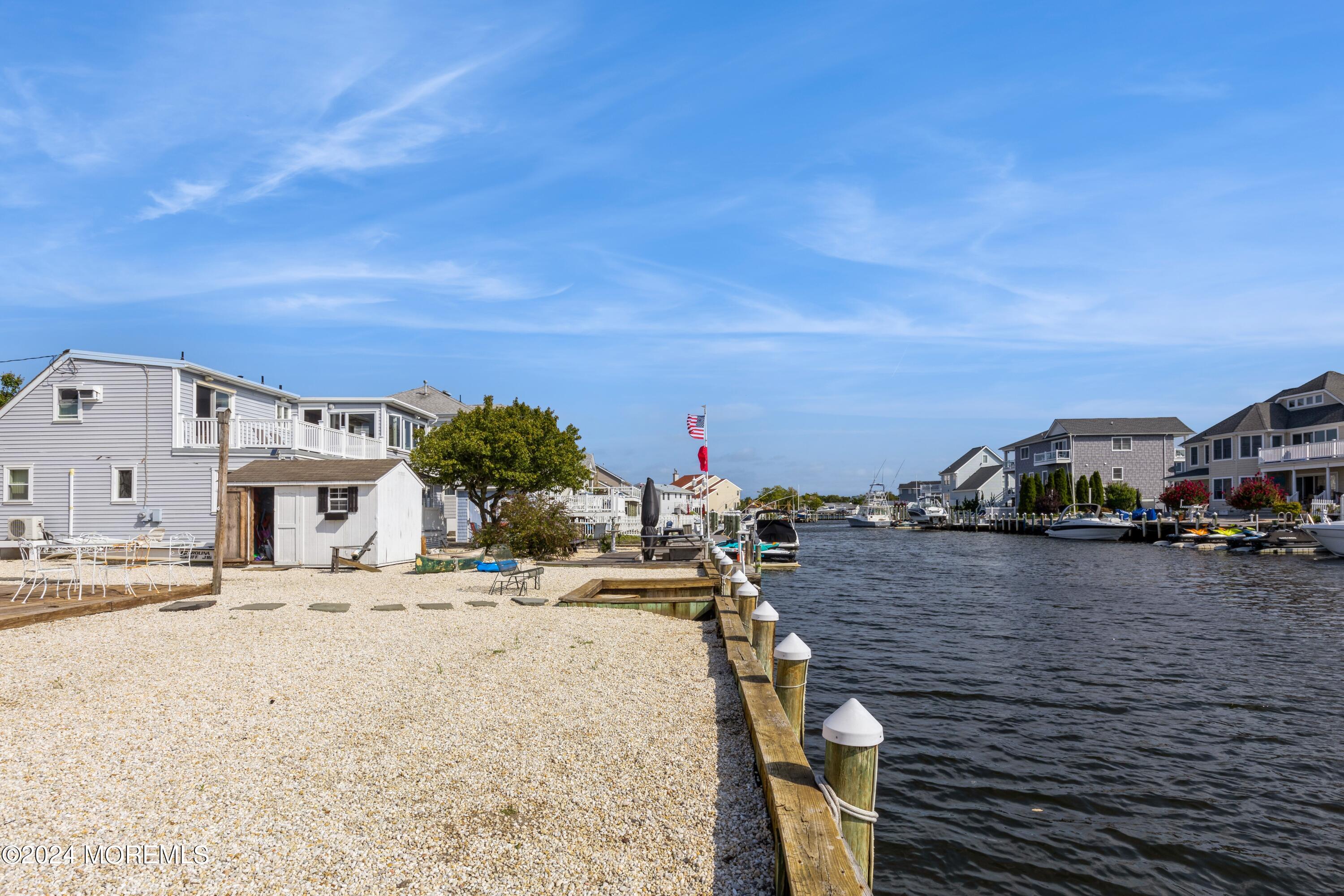 121 Montclair Road North Barnegat, NJ 08005 - Photo 4 of 15 a view of a terrace with wooden fence