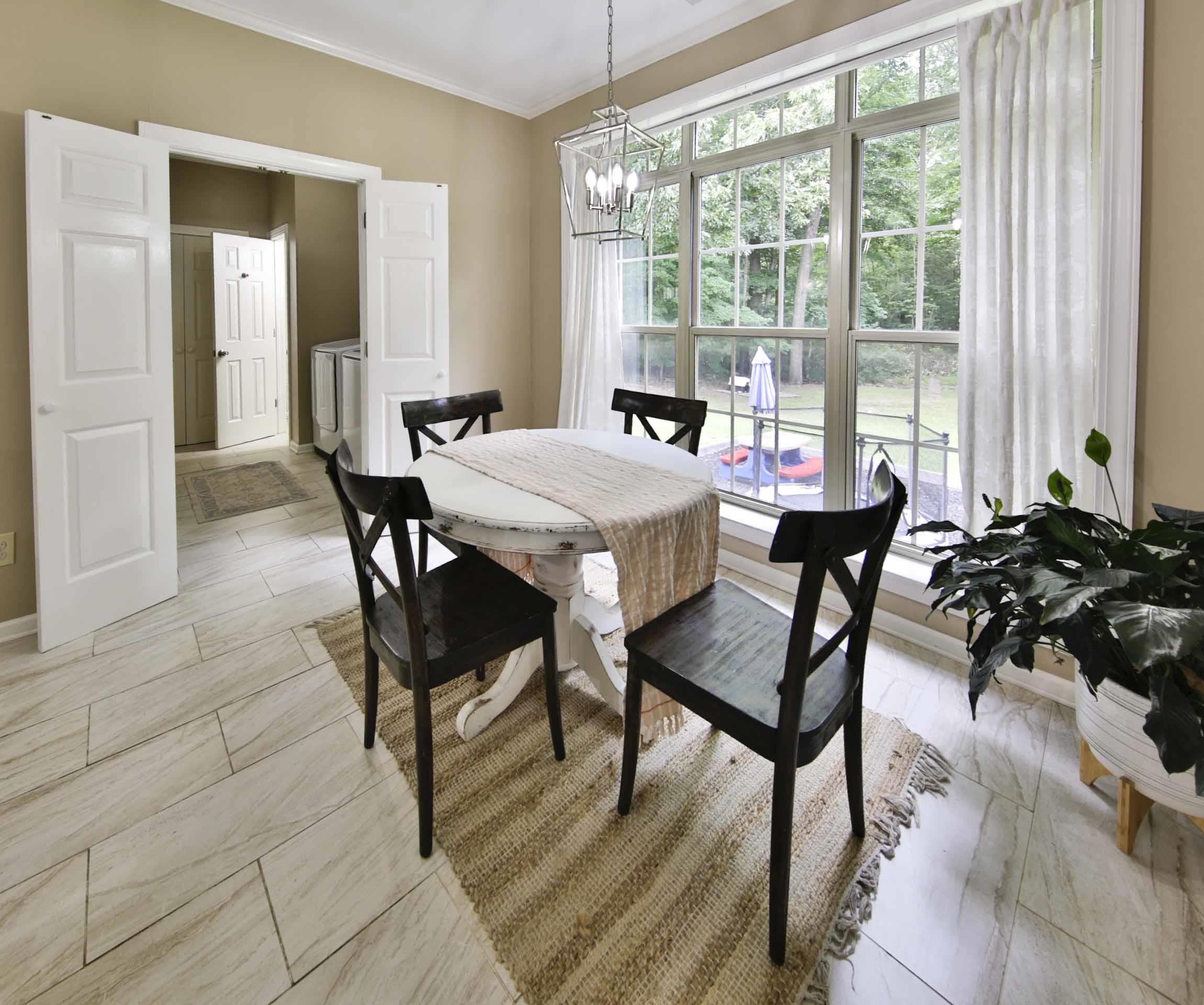 104 Miller Road Covington, TN 38019 - Photo 13 of 25 Expansive windows with backyard views