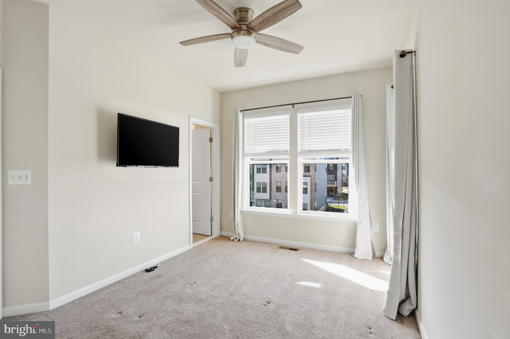 211 Narrowleaf Way Laurel, MD 20724 - Photo 21 of 36 a view of a livingroom with a flat screen tv