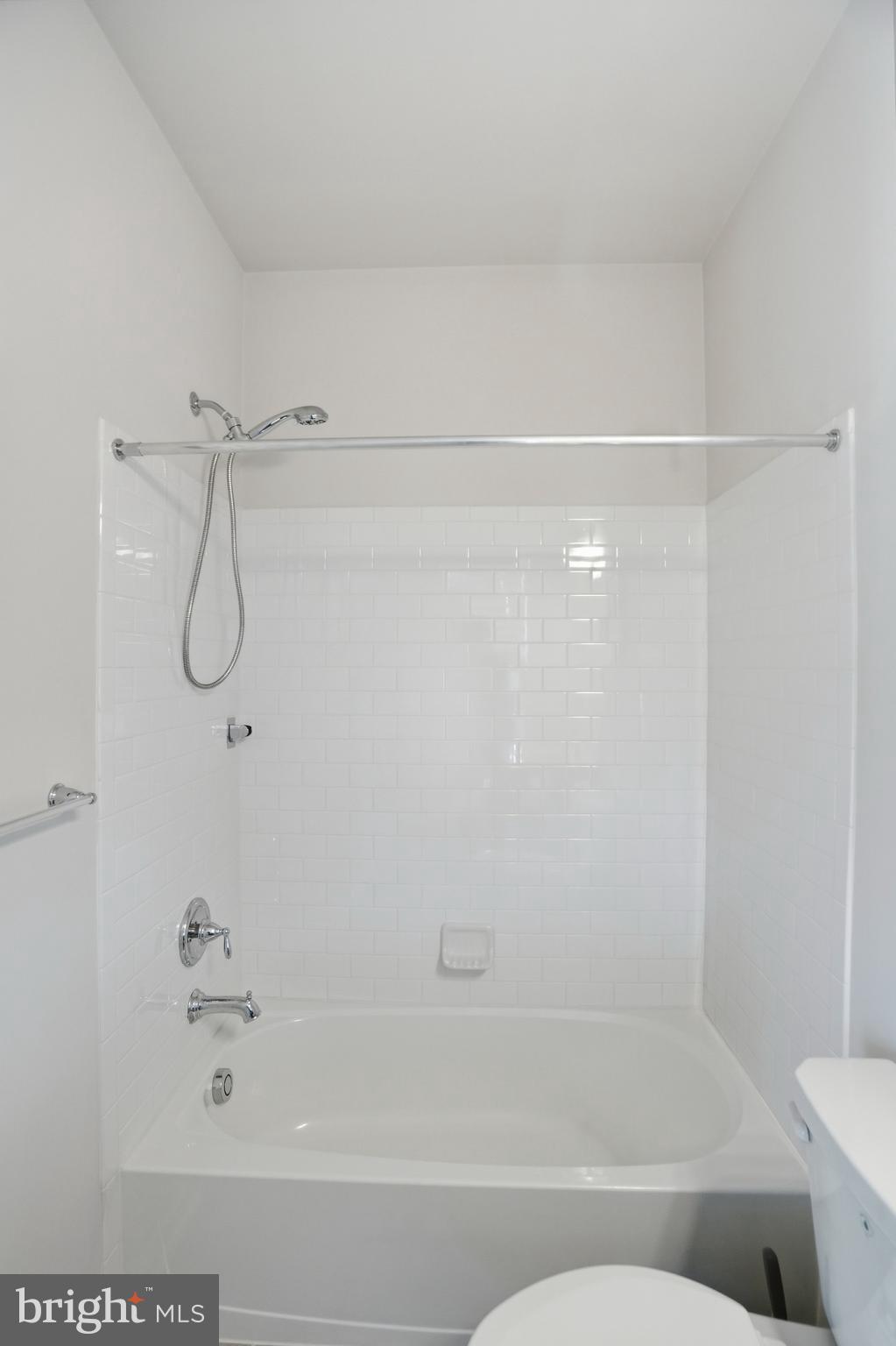 211 Narrowleaf Way Laurel, MD 20724 - Photo 27 of 36 a bathroom with a bathtub
