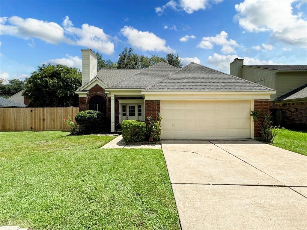 5202 Spring Cir Drive Pearland, TX 77584 - Photo 1 of 19 a front view of house with yard