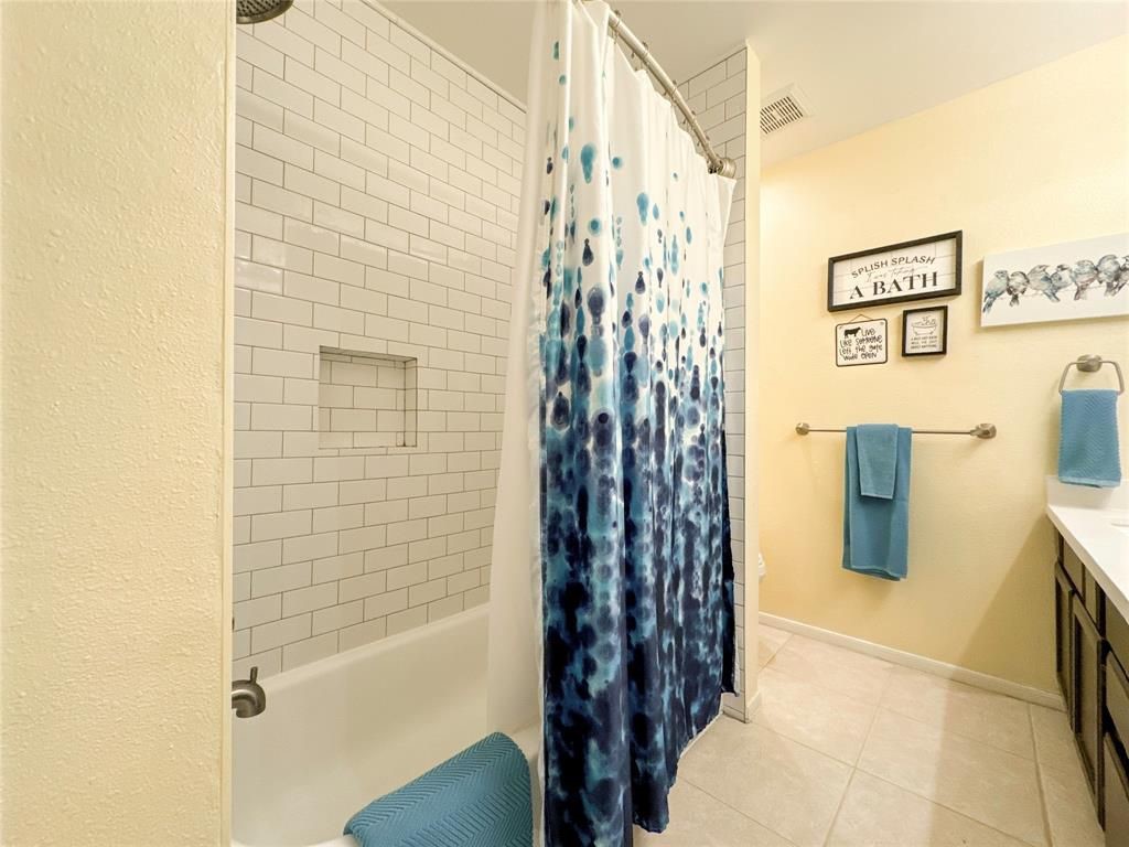 5202 Spring Cir Drive Pearland, TX 77584 - Photo 15 of 19 a bathroom with a shower