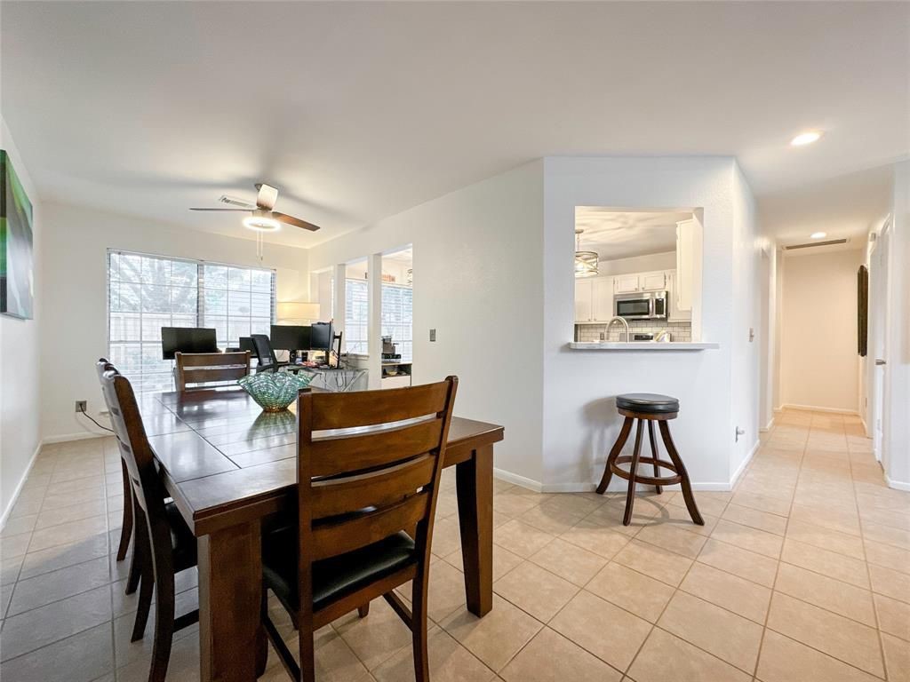 5202 Spring Cir Drive Pearland, TX 77584 - Photo 5 of 19 a view of a dining room with furniture
