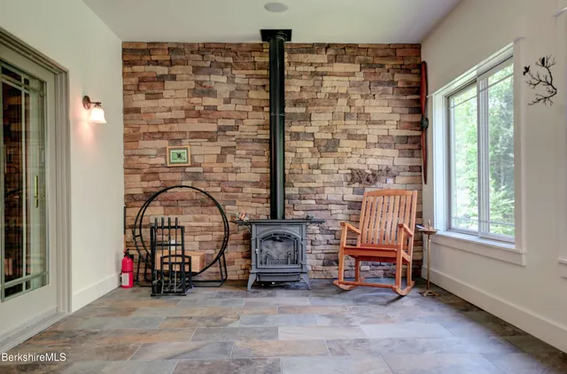 a view of front door with outdoor seating