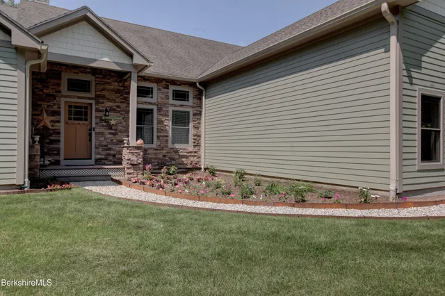 a front view of a house with patio