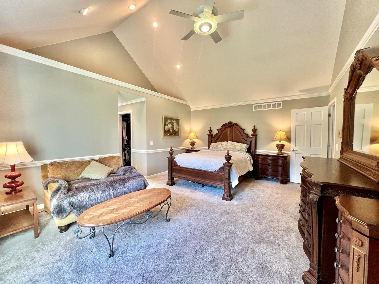 4111 Steeple Run Crystal Lake, IL 60014 - Photo 15 of 50 a spacious bedroom with a bed and a chandelier