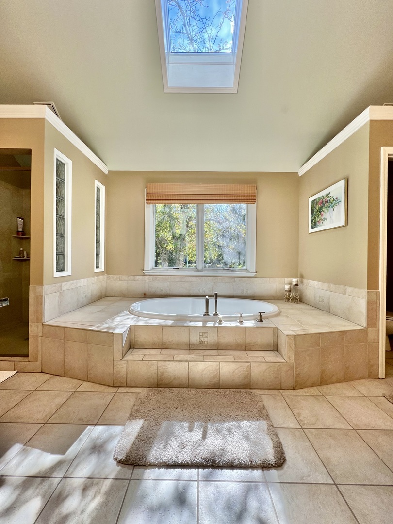 4111 Steeple Run Crystal Lake, IL 60014 - Photo 17 of 50 a spacious bathroom with bathtub and window