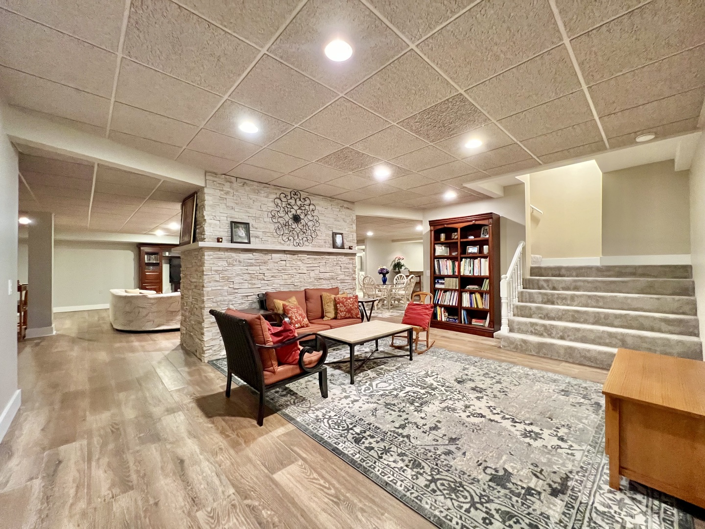 4111 Steeple Run Crystal Lake, IL 60014 - Photo 35 of 50 a living room with furniture and a wooden floor