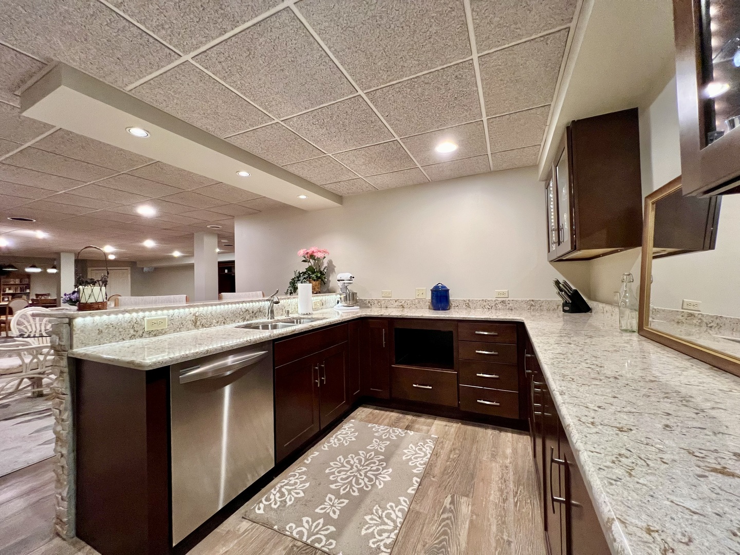 4111 Steeple Run Crystal Lake, IL 60014 - Photo 37 of 50 a kitchen with kitchen island granite countertop a sink and cabinets