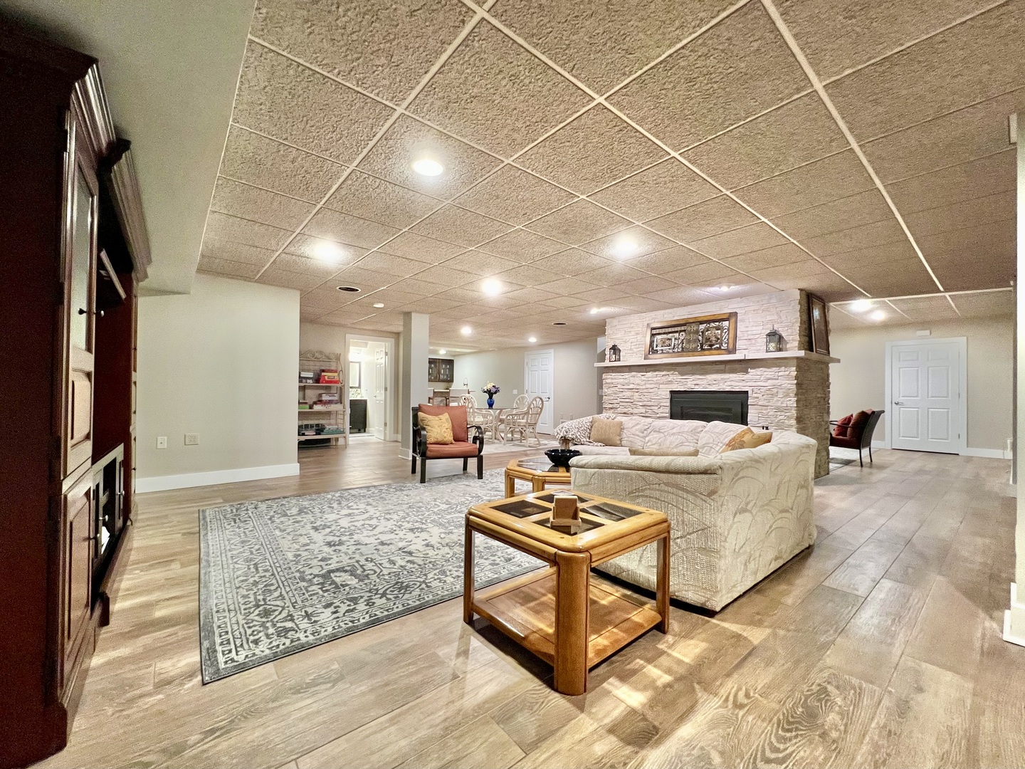 4111 Steeple Run Crystal Lake, IL 60014 - Photo 40 of 50 a living room with furniture and a flat screen tv