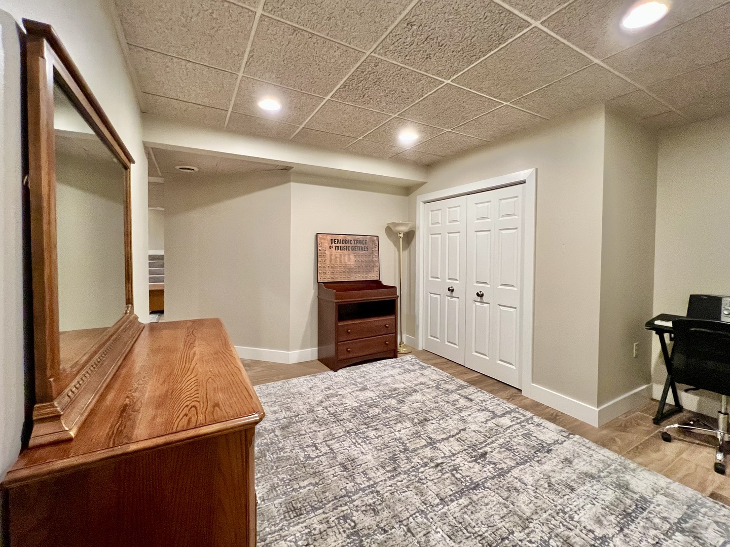 4111 Steeple Run Crystal Lake, IL 60014 - Photo 45 of 50 a room with furniture and a flat screen tv