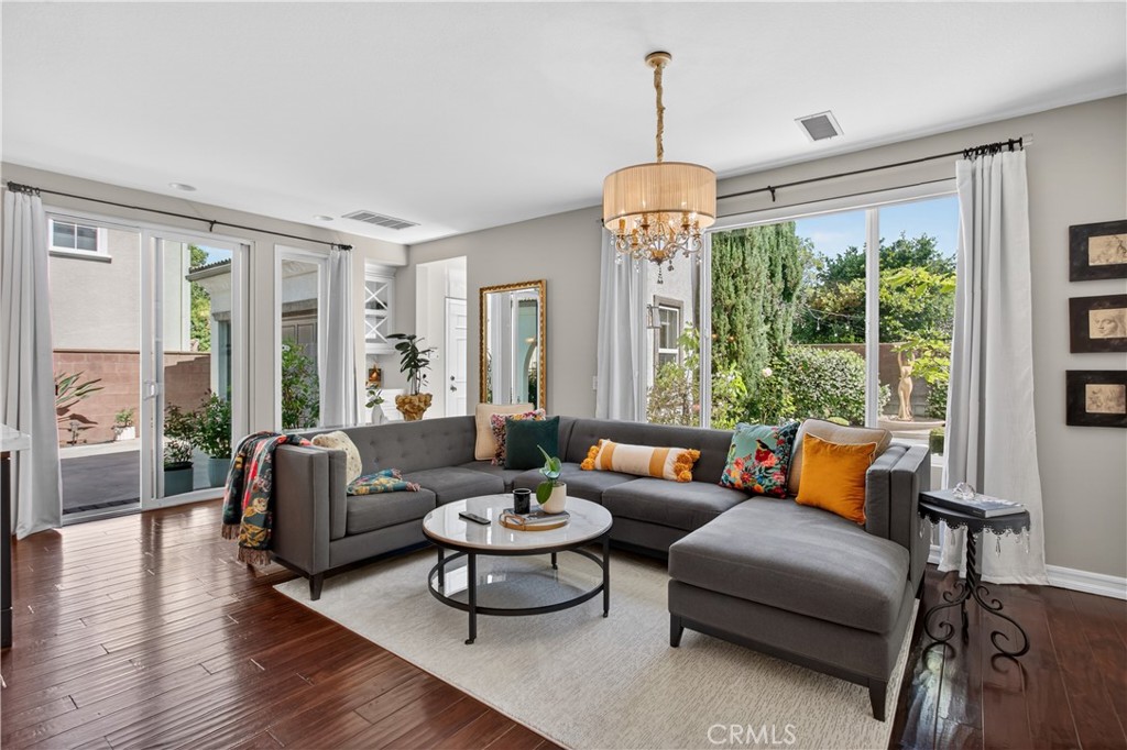 89 Dawnwood Ladera Ranch, CA 92694 - Photo 11 of 47 a living room with furniture and a large window