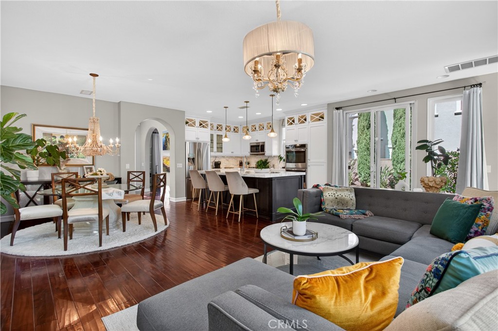 89 Dawnwood Ladera Ranch, CA 92694 - Photo 17 of 47 a living room with furniture kitchen and a chandelier